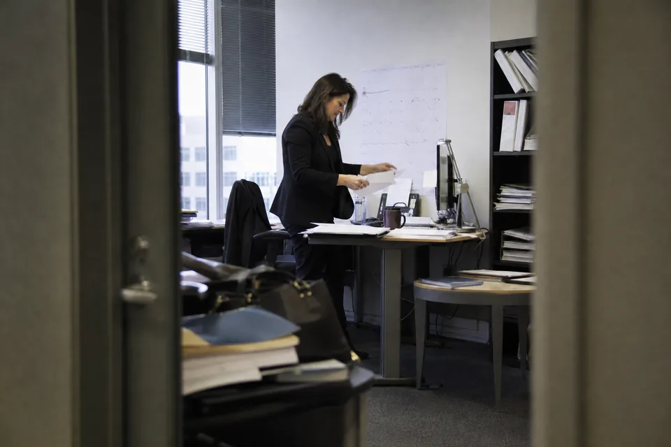 An investor relations team working through the quarter in one shared workspace